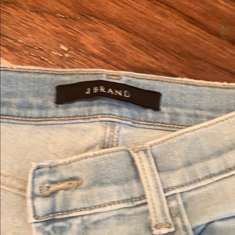 Barely worn light-denim skinny jeans with holes. - Picture 2 of 6